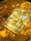 Serviettes en coton rayées jaunes motif citron faites en France par lot de 2 design méditerranéen pour table d'été.