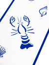 Coudre Paris crée des Chemins de table haut de gamme blanc et bleu motif homard et coquillages. 100% coton fait en France, design méditerranéen pour table d'été